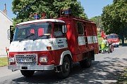 Defilé hasičských vozů a povozů