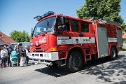 Defilé hasičských vozů a povozů